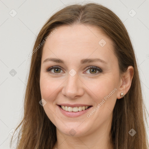 Joyful white young-adult female with long  brown hair and grey eyes