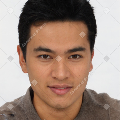 Joyful latino young-adult male with short  brown hair and brown eyes