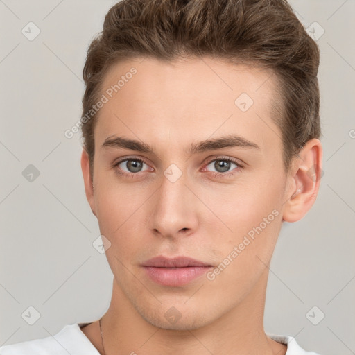 Neutral white young-adult male with short  brown hair and brown eyes