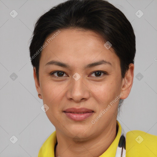 Joyful asian young-adult female with short  brown hair and brown eyes