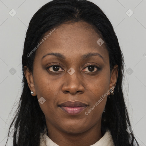 Joyful black young-adult female with long  black hair and brown eyes