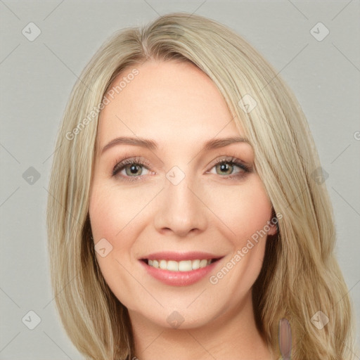 Joyful white young-adult female with long  brown hair and blue eyes