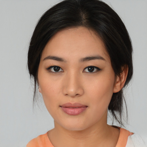 Neutral asian young-adult female with medium  black hair and brown eyes