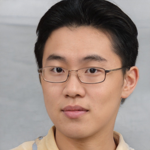 Neutral asian young-adult male with short  brown hair and brown eyes