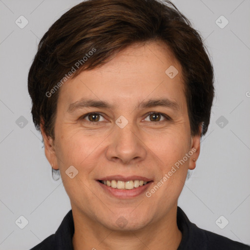 Joyful white adult female with short  brown hair and brown eyes