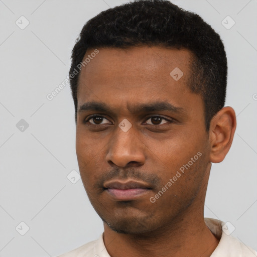 Neutral black young-adult male with short  black hair and brown eyes