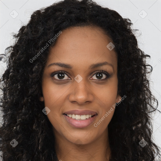 Joyful black young-adult female with long  brown hair and brown eyes