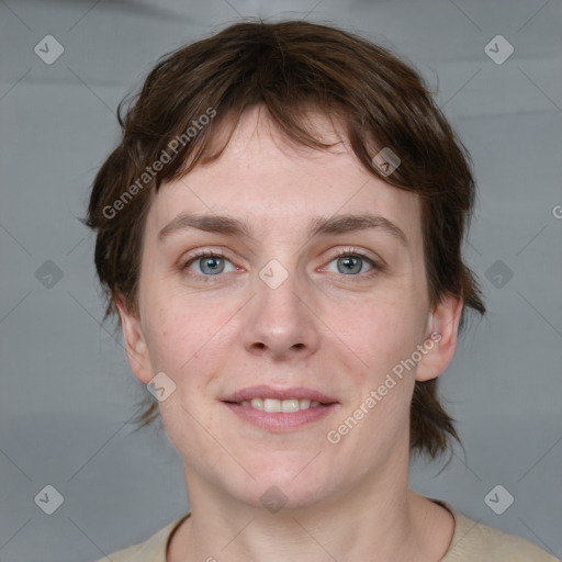 Joyful white young-adult female with medium  brown hair and grey eyes