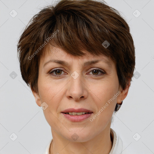 Joyful white adult female with short  brown hair and brown eyes