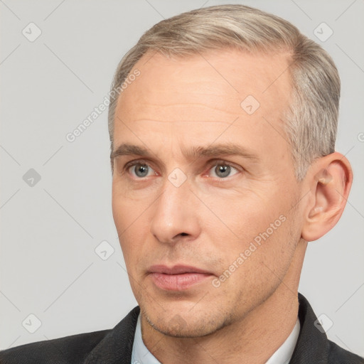 Neutral white adult male with short  brown hair and brown eyes