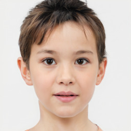 Joyful white child male with short  brown hair and brown eyes