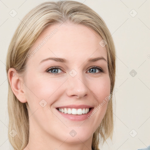 Joyful white young-adult female with medium  brown hair and blue eyes