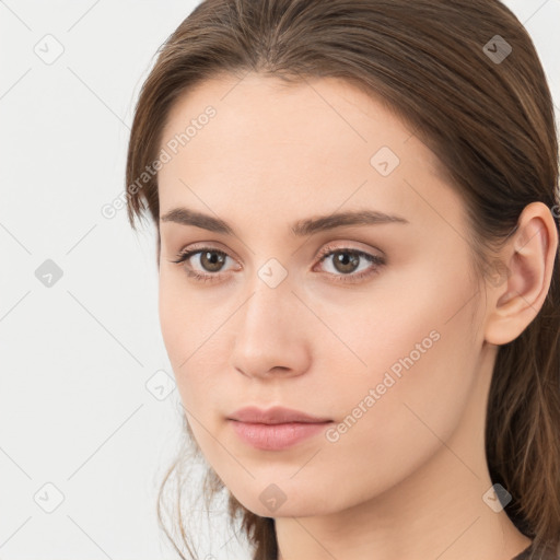 Neutral white young-adult female with medium  brown hair and brown eyes