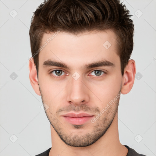 Neutral white young-adult male with short  brown hair and brown eyes