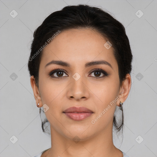 Joyful latino young-adult female with long  brown hair and brown eyes