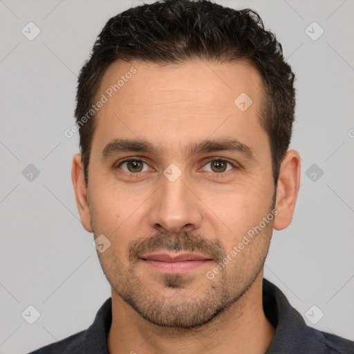 Joyful white young-adult male with short  brown hair and brown eyes