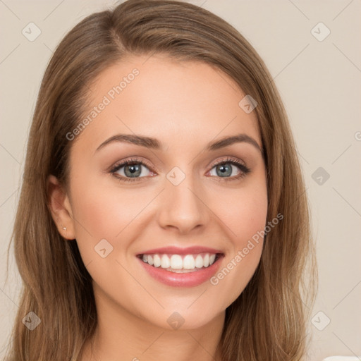 Joyful white young-adult female with long  brown hair and green eyes