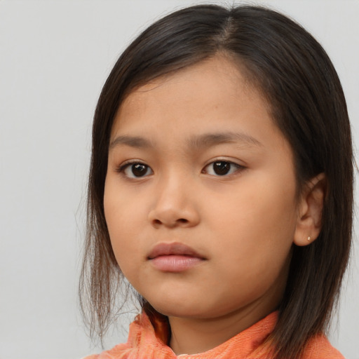 Neutral asian child female with medium  brown hair and brown eyes