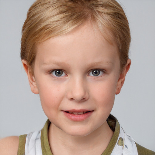 Joyful white child female with short  brown hair and blue eyes