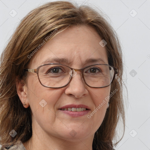 Joyful white adult female with medium  brown hair and grey eyes