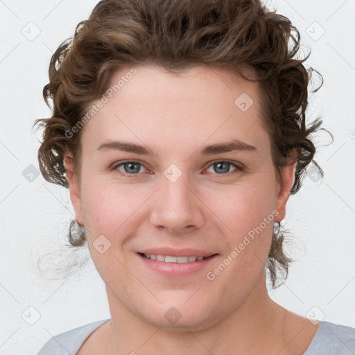 Joyful white young-adult female with medium  brown hair and blue eyes