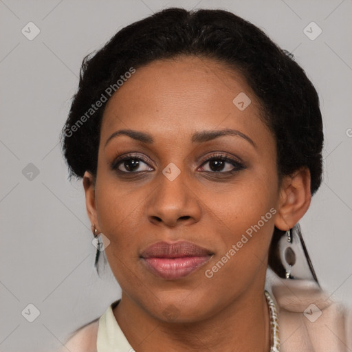 Joyful latino adult female with short  brown hair and brown eyes