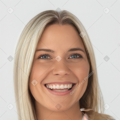 Joyful white young-adult female with long  brown hair and blue eyes