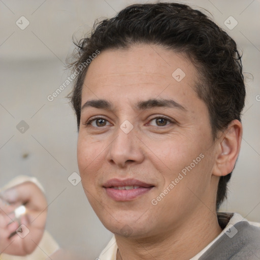 Joyful white adult female with short  brown hair and brown eyes