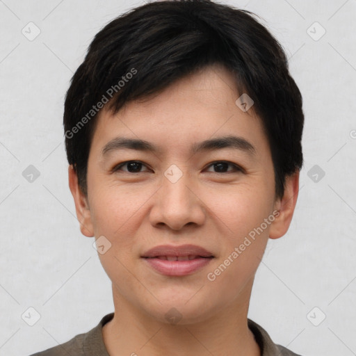 Joyful asian young-adult male with short  black hair and brown eyes