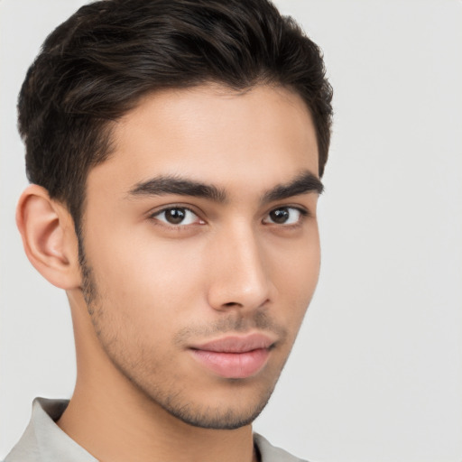 Neutral white young-adult male with short  brown hair and brown eyes