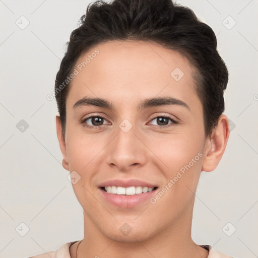 Joyful white young-adult female with short  brown hair and brown eyes