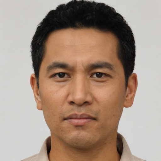 Neutral asian adult male with short  black hair and brown eyes