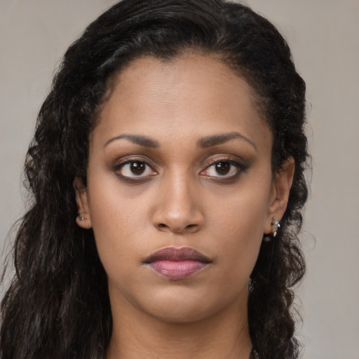 Neutral latino young-adult female with long  black hair and brown eyes