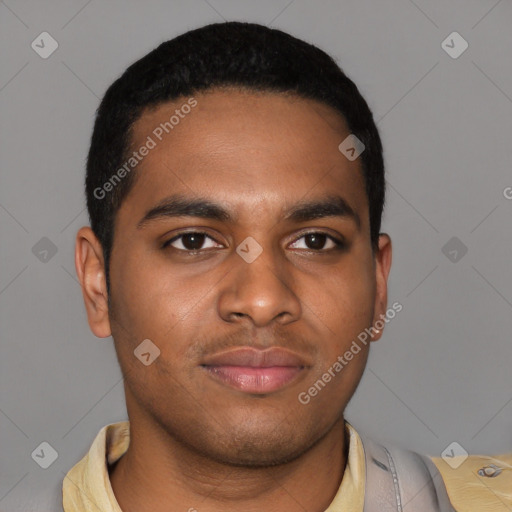 Joyful latino young-adult male with short  black hair and brown eyes