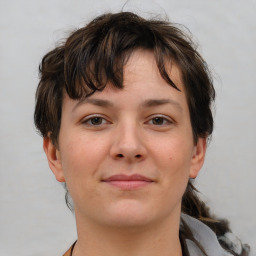 Neutral white young-adult female with short  brown hair and brown eyes