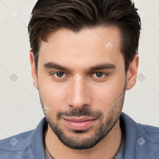 Joyful white young-adult male with short  brown hair and brown eyes