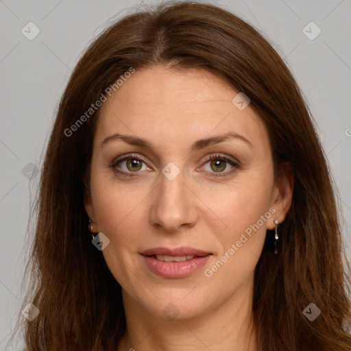 Joyful white young-adult female with long  brown hair and green eyes