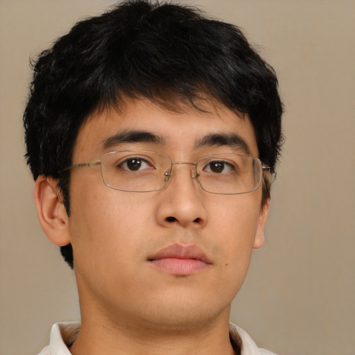 Neutral asian young-adult male with short  brown hair and brown eyes