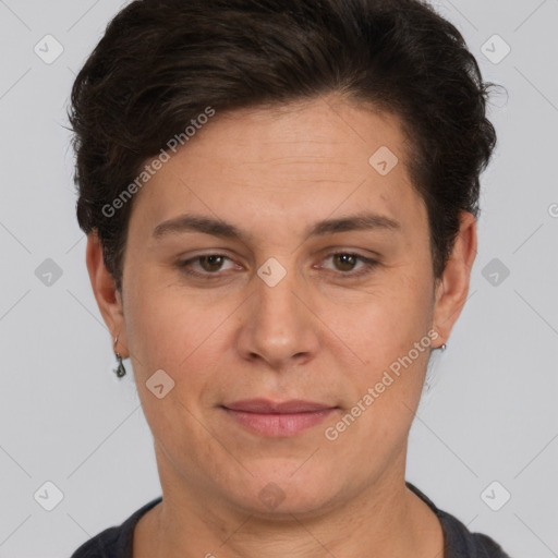 Joyful white adult female with short  brown hair and brown eyes