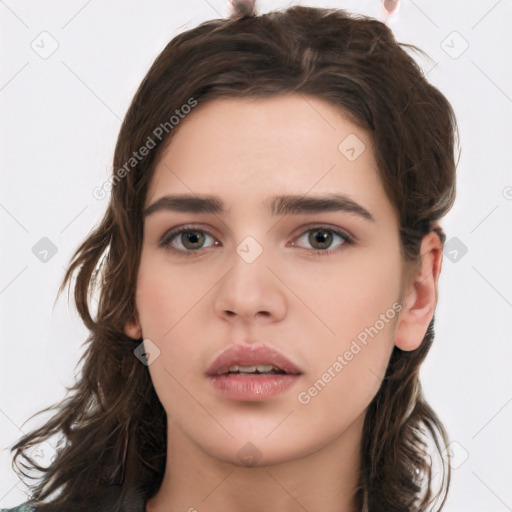 Neutral white young-adult female with long  brown hair and brown eyes