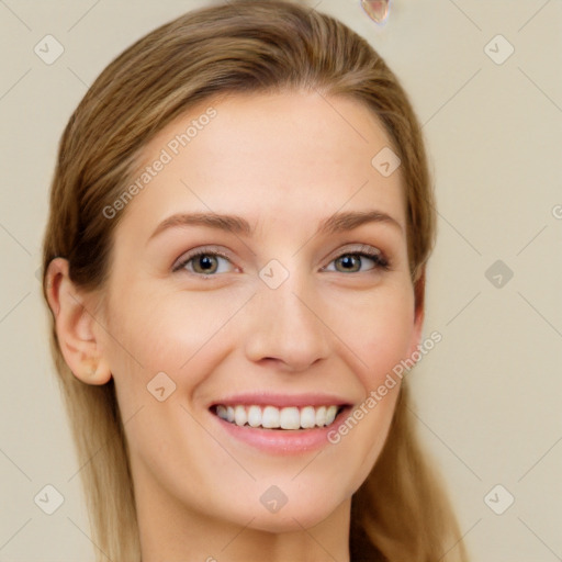 Joyful white young-adult female with long  brown hair and grey eyes