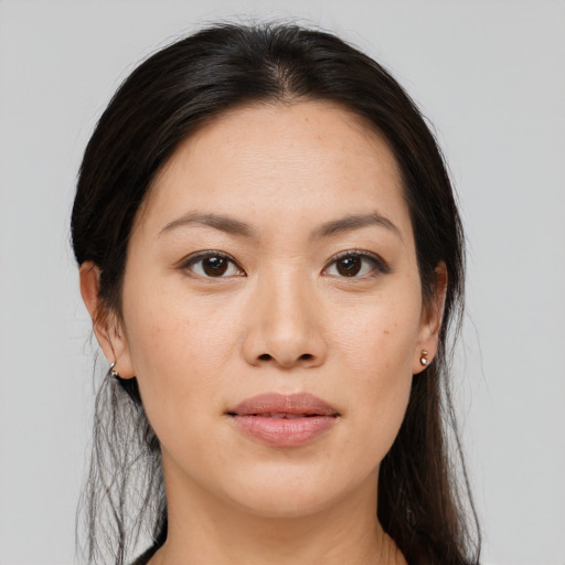 Joyful white young-adult female with medium  brown hair and brown eyes