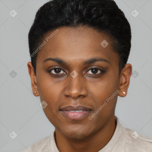 Joyful black young-adult female with short  black hair and brown eyes