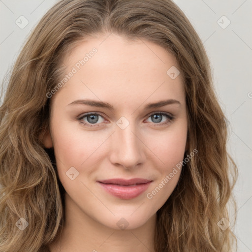 Joyful white young-adult female with long  brown hair and green eyes