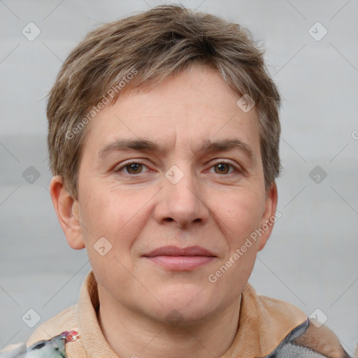 Joyful white adult male with short  brown hair and grey eyes