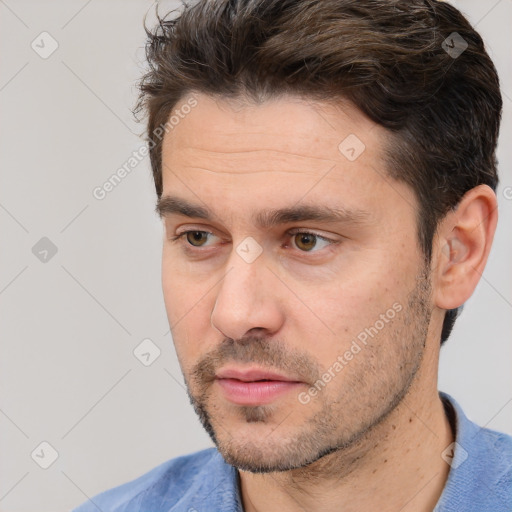 Neutral white adult male with short  brown hair and brown eyes