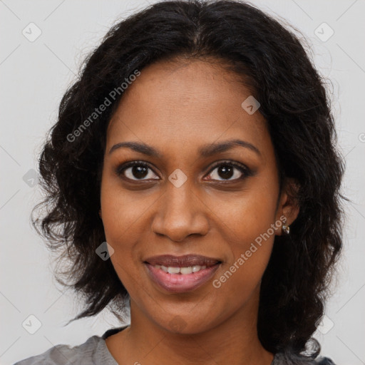 Joyful black young-adult female with medium  brown hair and brown eyes