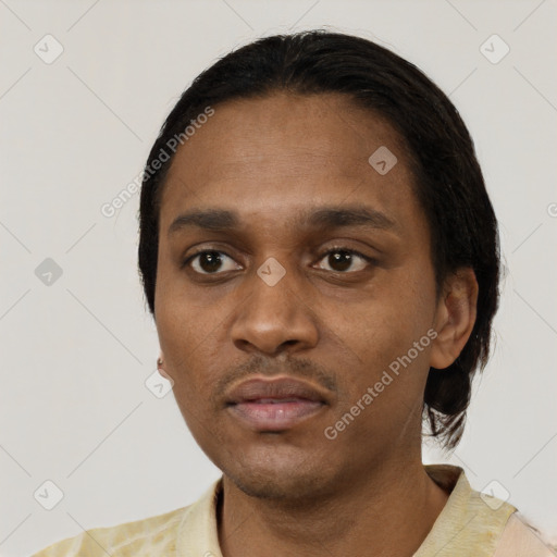 Neutral black young-adult male with short  black hair and brown eyes