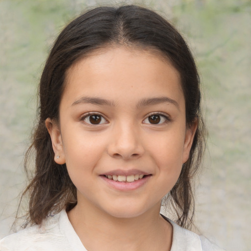 Joyful white child female with medium  brown hair and brown eyes