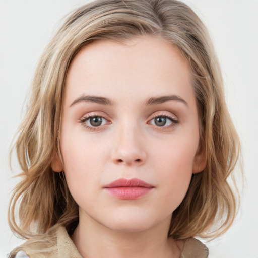 Neutral white young-adult female with medium  brown hair and blue eyes